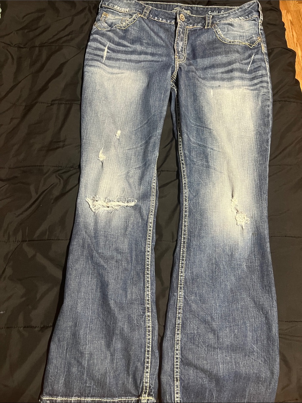 Silver Jeans Women’s Blue Distressed Flare Jeans